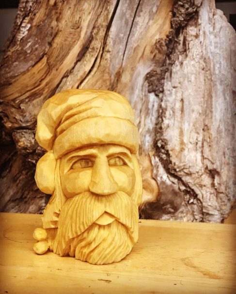 Santa carved out of wood
Author - <a href="https://www.instagram.com/mrsfoodhaikus/" rel="nofollow">Cathryn Smith</a>